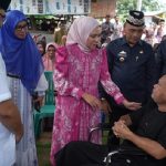 Serahkan Bantuan Disabilitas, Ketua TP PKK Provinsi Lampung Purnama Wulan Sari Mirza Safari Ramadhan di Kota Metro