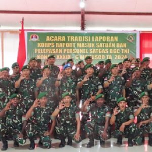 Dandim 1710/Mimika Pimpin Acara Tradisi Korps Raport Masuk Satuan dan Pelepasan Personel Satgas BGC TNI Konga XXXIX-G Monusco TA 2024