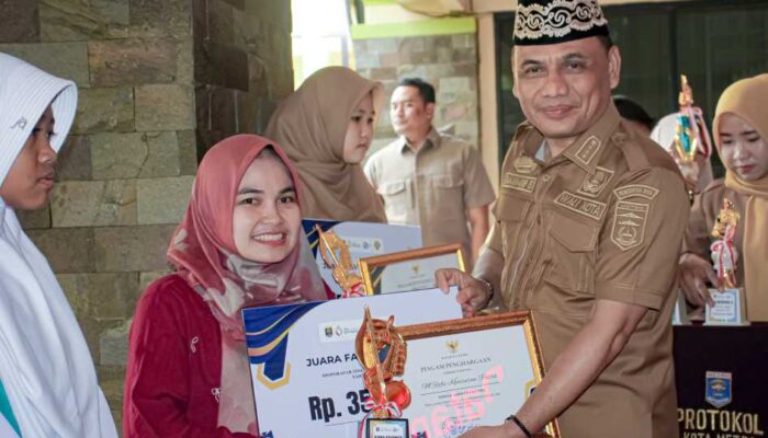 Semarak Disporapar Singing Competetion 2025: Wali Kota Metro Serahkan Hadiah dan Luncurkan Lagu Kebanggaan Daerah