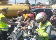 Operasi Patuh Toba 2025: Polrestabes Medan Edukasi Warga Soal Keselamatan Berkendara