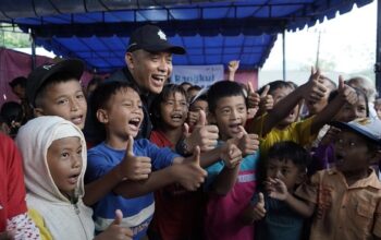 PalmCo Pulihkan Trauma Warga Pascabanjir