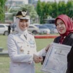 Wakil Gubernur Lampung Jihan Nurlela saat memimpin upacara HUT ke-62 Lampung.