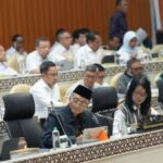 Menteri PU Dody Hanggodo saat rapat kerja dengan Komisi V DPR RI membahas program padat karya 2026.