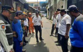 Camat Tambora memimpin apel Program TAMPAN bersama aparat gabungan di wilayah Tambora Jakarta Barat.