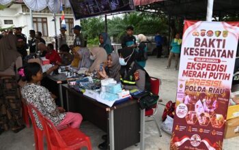 Lawan Malaria di Pesisir Rokan Hilir, Polda Riau Layani Pemeriksaan Kesehatan Gratis