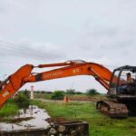 Cegah Banjir di Labuhanbatu, PTPN IV Kerahkan Ekskavator Normalisasi Saluran Air